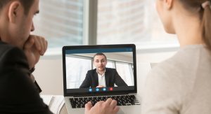 Employees participate virtual conference with boss running business remotely, businesspeople hold online meeting on laptop group chat, entrepreneurs making video call to partner, close up rear view